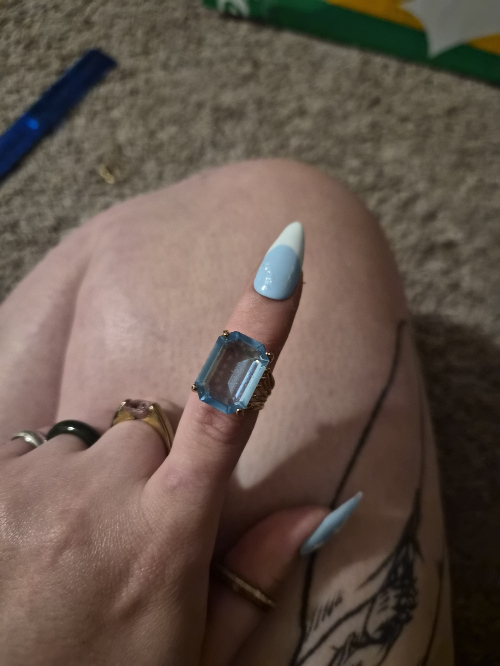 Gold Ring with Large Aquamarine-Blue Emerald-Cut Stone
